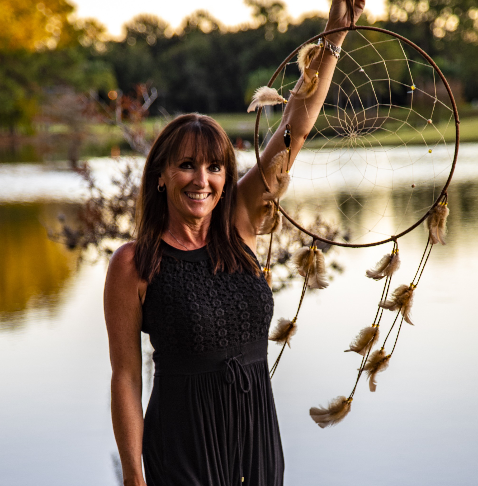 Ivy Gilbert holding a dreamcatcher